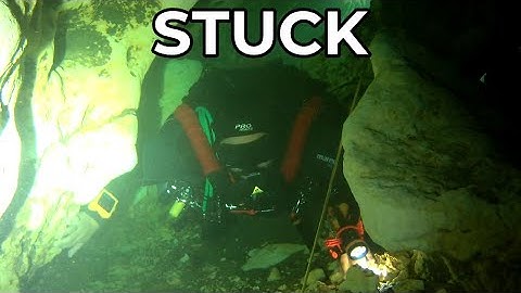 DIVERS REACT TO DIVER STUCK INSIDE A CAVE PLUS A REBREATHER FAILURE