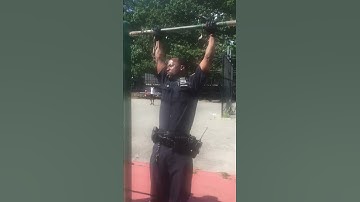 Police Officer Participates In "Pull-up Park Jam" In Uniform