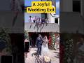A Joyful Wedding Exit Surrounded by Love