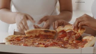 VERIFY | Are greasy pizza boxes unrecyclable?