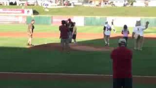 Community Impact Publisher throws out first pitch