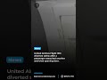 Passenger Attempts to Open Plane Door Mid-Flight Emergency