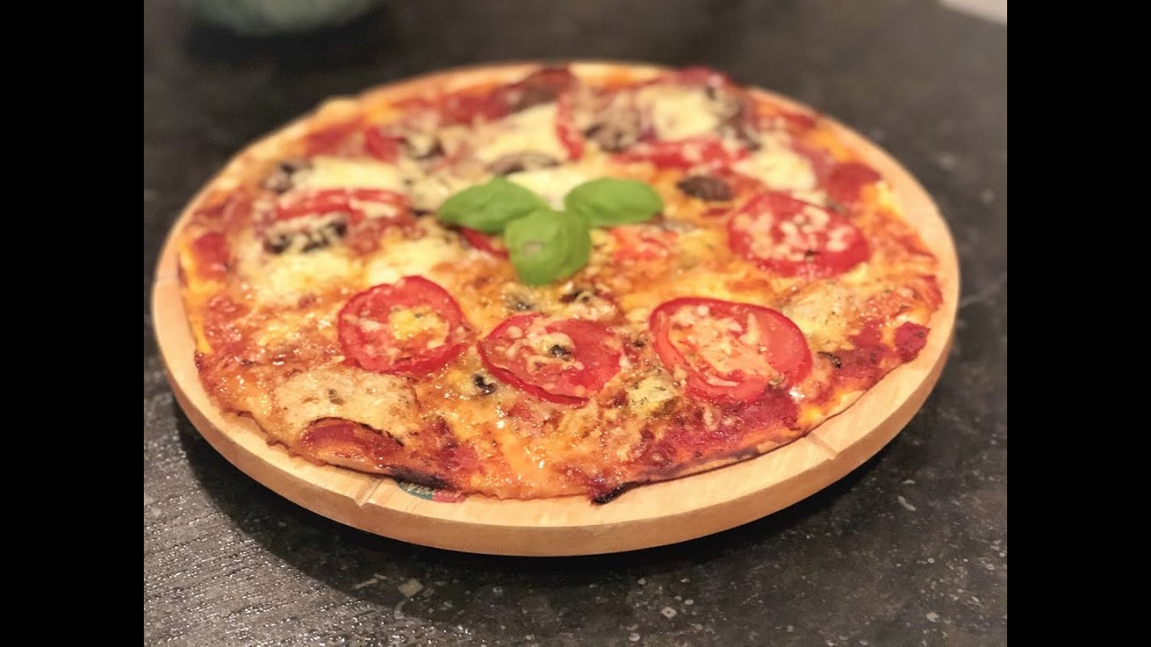 Zelf pizza - recept Familiefavorieten.nl