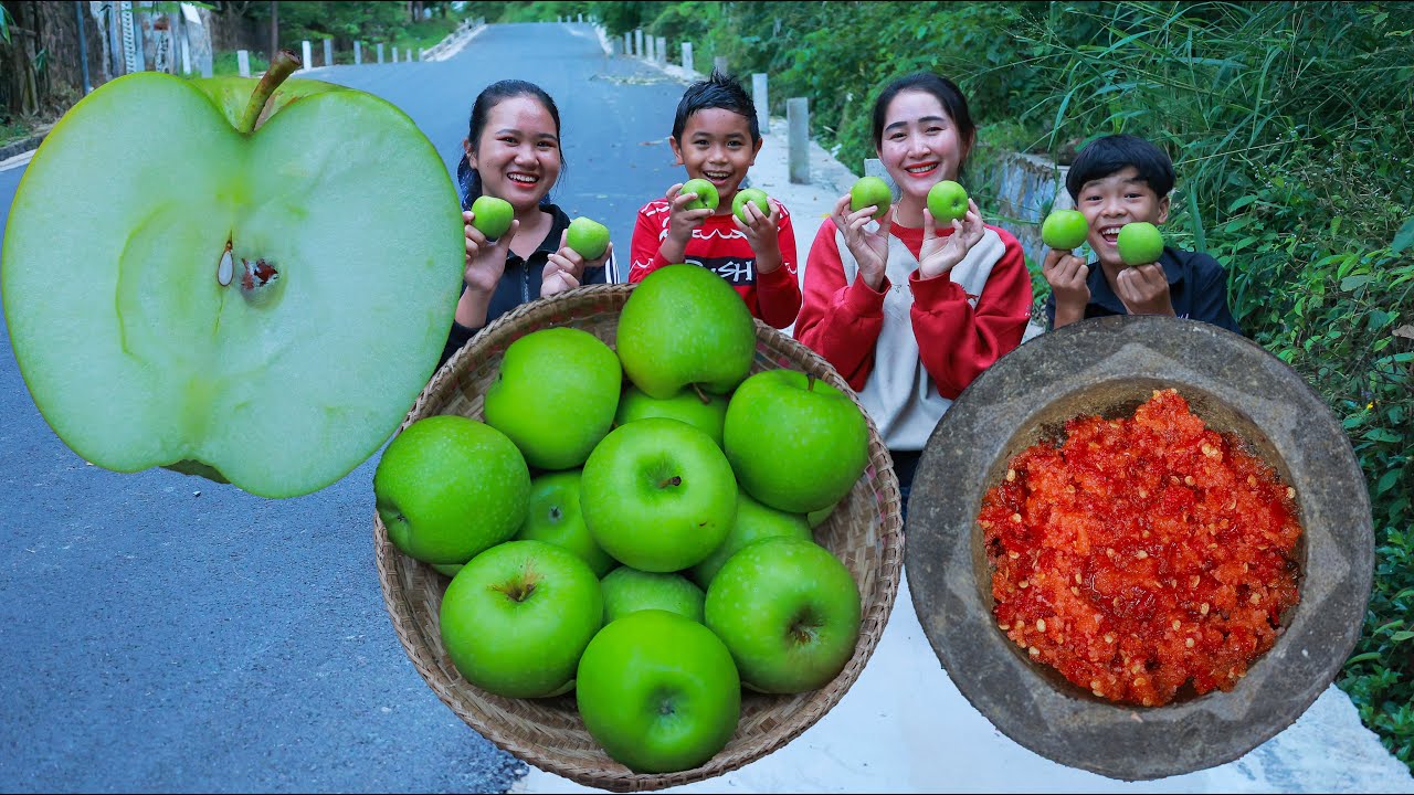 Juicy eating green apple with spicy chili salt Spicy eating apple