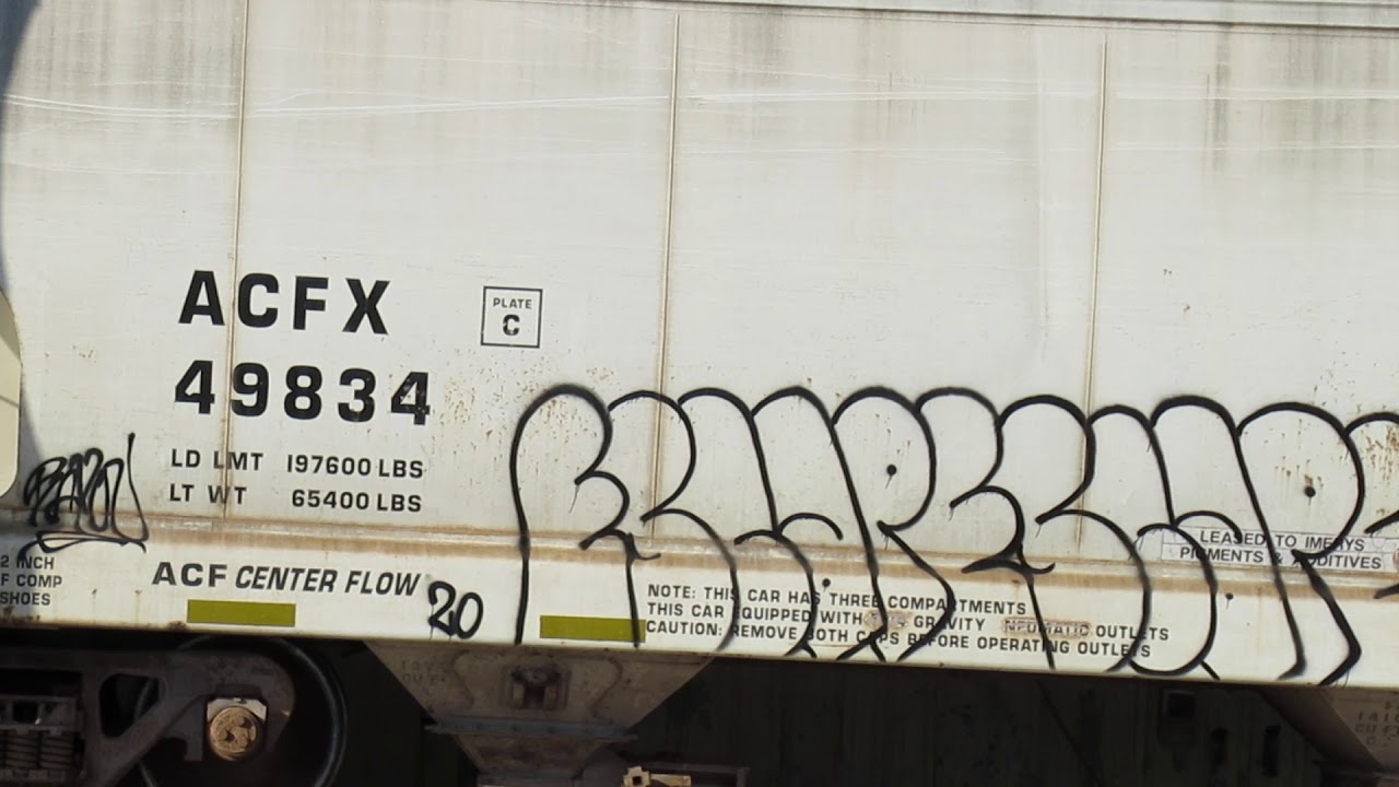 Looking closely at American Car & Foundry Center Flow covered hoppers at the HARBORLITE plant in MI