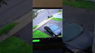 Car tire rolls down the street and hits car door (2/2)