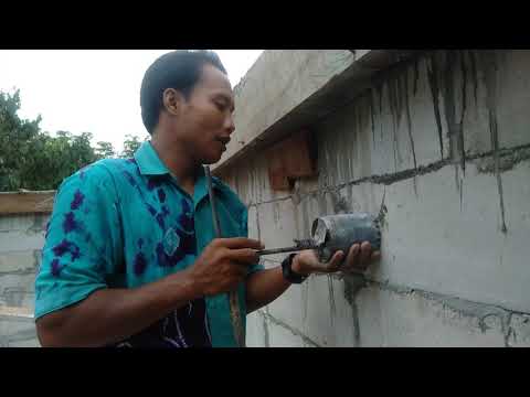 Video: Bagaimana Anda membuat lubang di Bata?