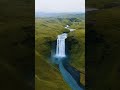 A Breathtaking View A Waterfall In Iceland Shorts Travel