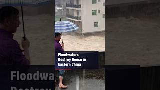 Floodwaters Destroy House in Eastern China