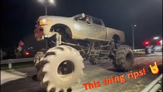 Poseidon mega truck floats in the mud and smokes the tires on the tug pad at Woodpecker Mud Bog
