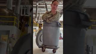 Army woman goes headfirst into garbage/trash can that tips over causing her to hurt face