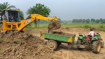 Jcb 3dx Plus Backhoe Machine Loading Mud in John Deere 5045 Di and Massey Ferguson 7250 Di Tractor