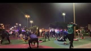 Energy fitness exercise with coach Djwara and Coach John in action