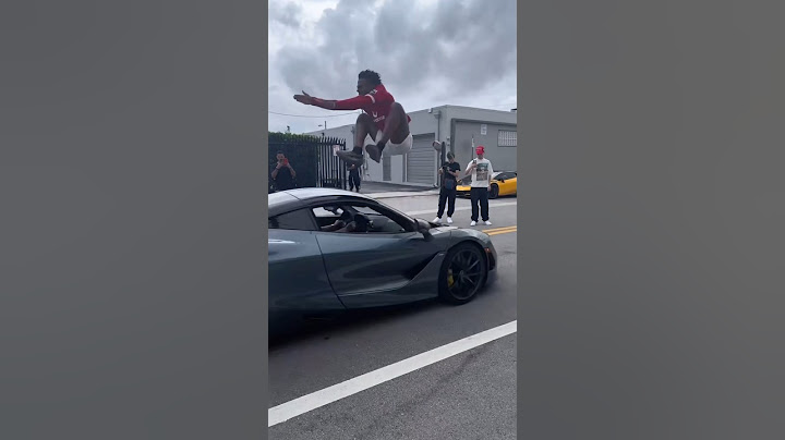 IShowSpeed Jumps Over 2 Speeding Race Cars