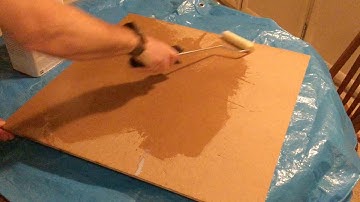 Preparing surface for mosaic tiles.