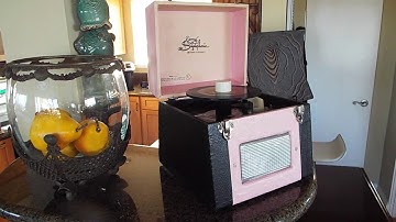 Symphonic 45 RPM automatic record player playing a stack of 45