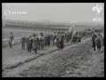 Grand National at Aintree: large crowds visit the course, inspect the jumps and speculate ...(1928)