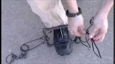 220 conibear - How to load with a rope.