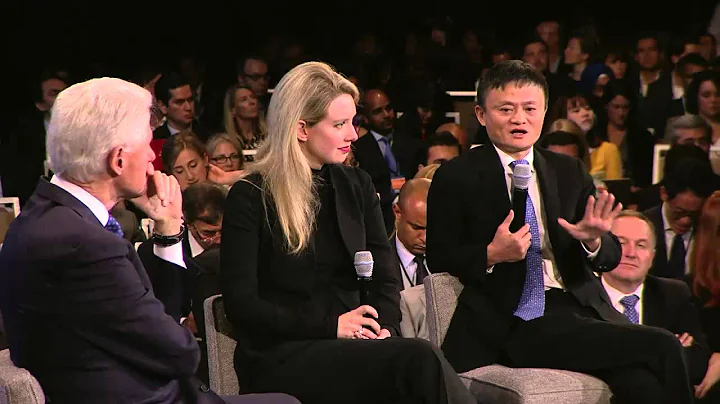 President Clinton speaks with Elizabeth Holmes and...
