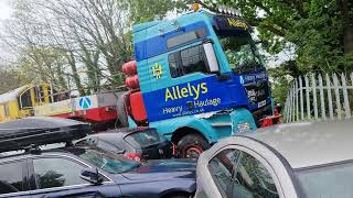 Lorry takes out 15 cars & injures 1 man outside Stonebridge Park train station. Lucky escape.