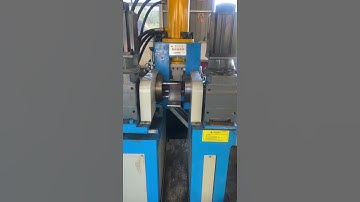 Automatic saddle clamp and pipe bracket making machine