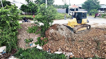 New Side Working With Dr51 Bulldozer Pushing Filling The Land Team Work Dump Truck Loading Rock