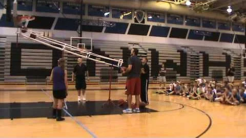 Bob Fisher demonstrating free throw shooting at the Cole Aldrich Basketball Camp