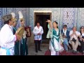 Folklore à Khiva (Khorezm, Ouzbékistan) chauffe les touristes