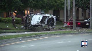 Miami-Dade deputy crashes into palm tree, causing vehicle to roll over