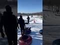 Snow tubing in a sunny day at park mont royal montreal canada