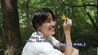 Jhope putting sunflower in his nose at BTS seasons greeting 2019