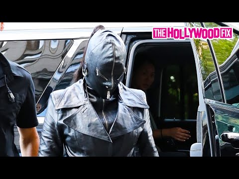Kim Kardashian Wears A Solid Black Leather Face Mask While Arriving To The Ritz Carlton Hotel In NY