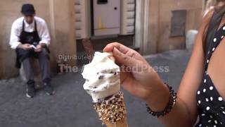 Tourists in Rome fight soaring temps with gelato as Italy faces 4th heatwave
