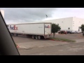 FedEx truck performing a sharp turn / Почтальон исполняет крутой поворот