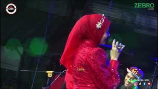 YUSNIA ZEBRO   MENGEJAR BADAI