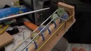 A prototype of marble lifter i have built using the principles
archimedes' screw to move marbles up upper level., its bit rough and
ready but good morning experimenting.