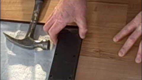 How to Install Laminate Flooring, Part 1 - Tapping Block