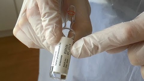 Opening an ampule and withdrawing medication