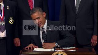 OBAMA BILL SIGNING:CAN'T TAKE YOU ANYWHERE (FUNNY)