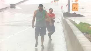 WATCH: KHOU crew helps rescue trapped truck driver