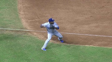 Uribe recovers with a strong throw to first