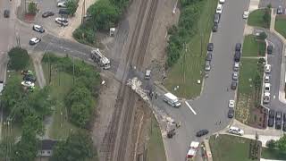 Amtrak passenger train hits cars on tracks near Hillsborough Street in Raleigh