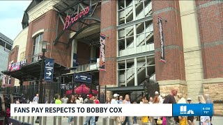 Fans pay their respects for beloved manager Bobby Cox after his death