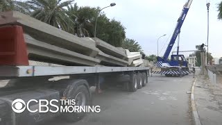Blast walls being removed in parts of Baghdad
