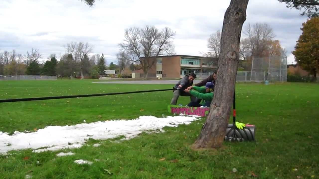 Josh testing a 20 ft Bungee on a snowboard
