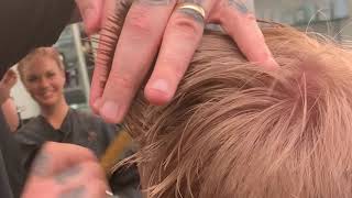Short soft texted pixie haircut with disconnection