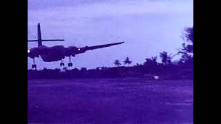Movie0054D 1970  Vietnam- Supply plane (Caribou C-7A) lands at Special Forces Camp A442