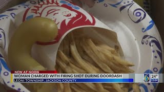 Woman charged with firing shot during DoorDash delivery
