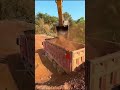 Excavators Load Soil Onto Trucks