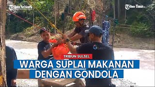 Jembatan Tersapu Banjir, Warga Kadundung Luwu Suplai Makanan Dengan Gondola